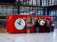 A Quick Snack! Fast Bar Clock in the Principe Pío Station in Madrid Spain