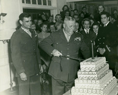 Clayton Vogel Cuts Cake on Marine Corps Birthday, 1943