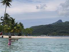 Patricia casting in the lagoon, Raiatea