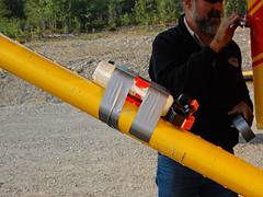 Bear spray taped to strut