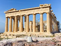 Lady sitting in front of Parthenon on Acropolis, Athens, Greece Lady sitting in front of Parthenon on Acropolis, Athens, Greece