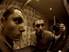 Fisheye portrait in a hotel bathroom