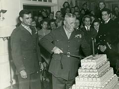 Clayton Vogel Cuts Cake on Marine Corps Birthday, 1943