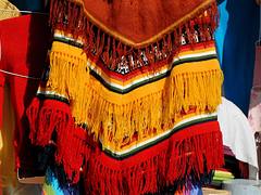 Poncho in Cochabamba market Poncho in Cochabamba market